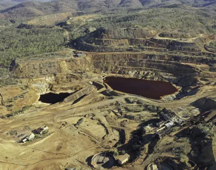 Heritage Minerals Mount Morgan Gold And Copper Tailings Reprocessing And Rehabilitation Aerial View Of Tailings Dam And Old Mine Site