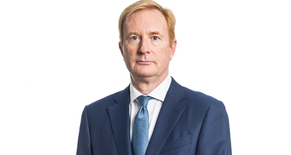 Robert Edel wearing a suit