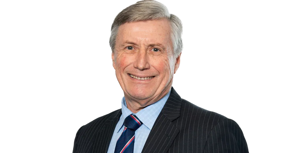 Mr Mark Gray wearing a suit