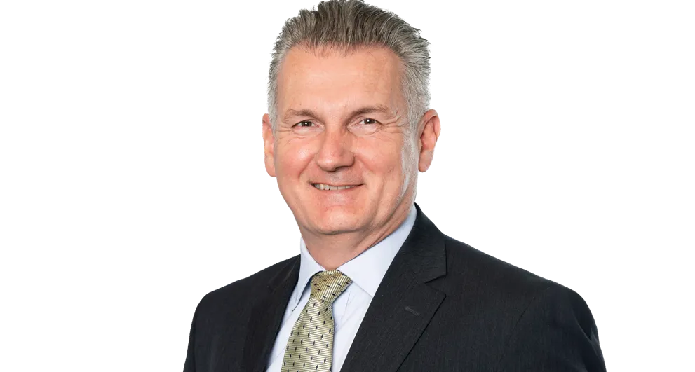 Stephen land wearing a suit