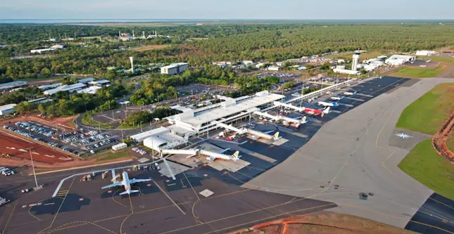 Aerial View Of Darwin Airport With Planes Terminal And Runway on Take off for airport upgrades across the NT