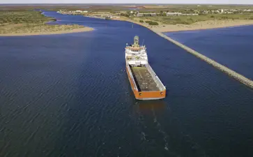 Onslow Marine Support Base Aerial View Of Ship Going Into River Mouth