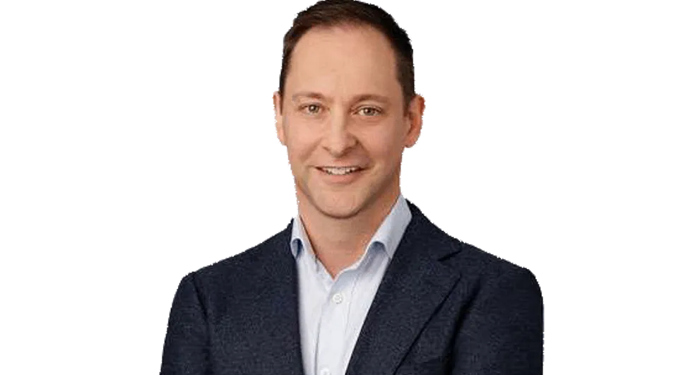 Nicholas Mant wearing a suit