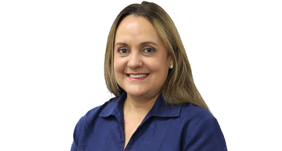 Cathie McBean wearing a blue collared shirt