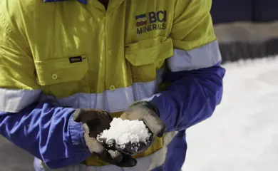 BCI Minerals Mardie Salt Project Worker Holding Salt