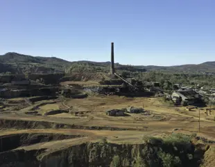 Heritage Minerals Mount Morgan Gold And Copper Tailings Reprocessing And Rehabilitation Chimney Stack And Abondoned Buildings Brown Dirt