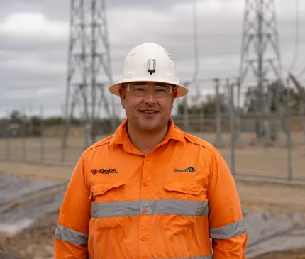 John Vanderloos wearing construction hat and hivis PPE at the Genex Kidston Pumped Storage Hydro Project